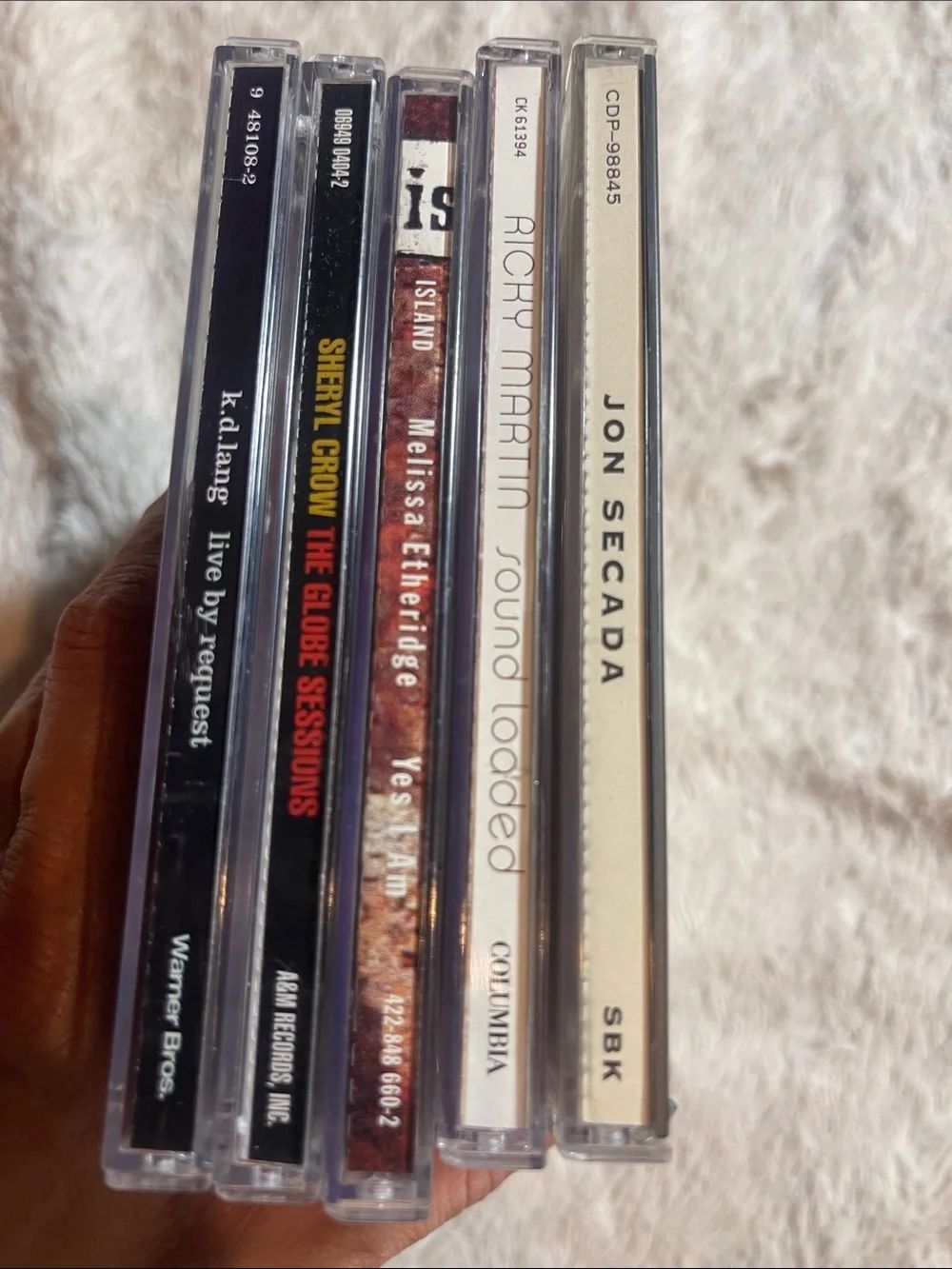 Assorted cd bundle, Sheryl Crow, Melissa Etheridge, Ricky, Martin and More.